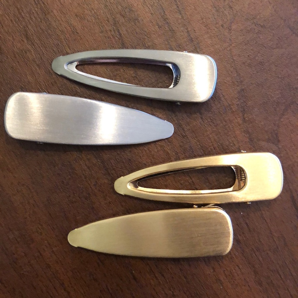NWOT. 4 Hair clips.